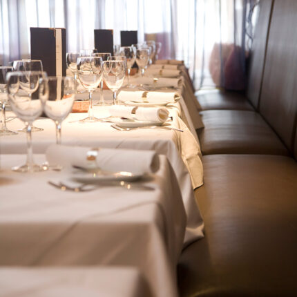 Bespoke long-table banquet layout for exclusive private parties at Zari Sussex.