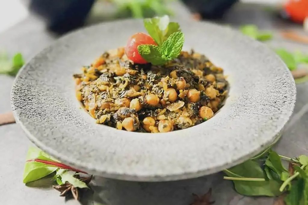 Healthy plant-based protein chana masala chickpea curry at Zari Crawley.