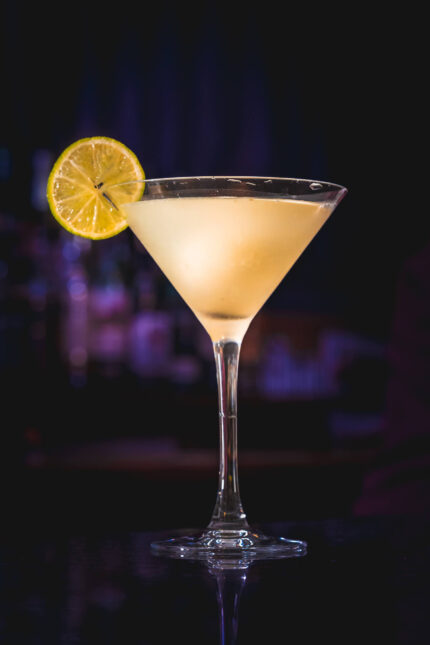 Festive cocktails and signature holiday drinks arranged elegantly on the bar counter.