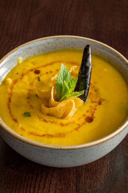Healthy, slow-simmered lentil tarka dal perfect for a plant-based diet.