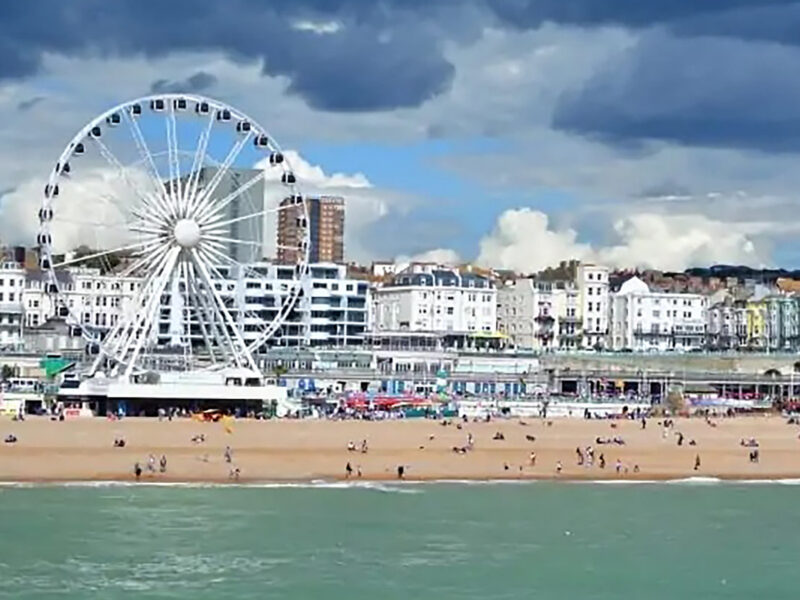Brighton beach and Ferris wheel on a sunny May Bank Holiday near Zari Restaurant Crawley.