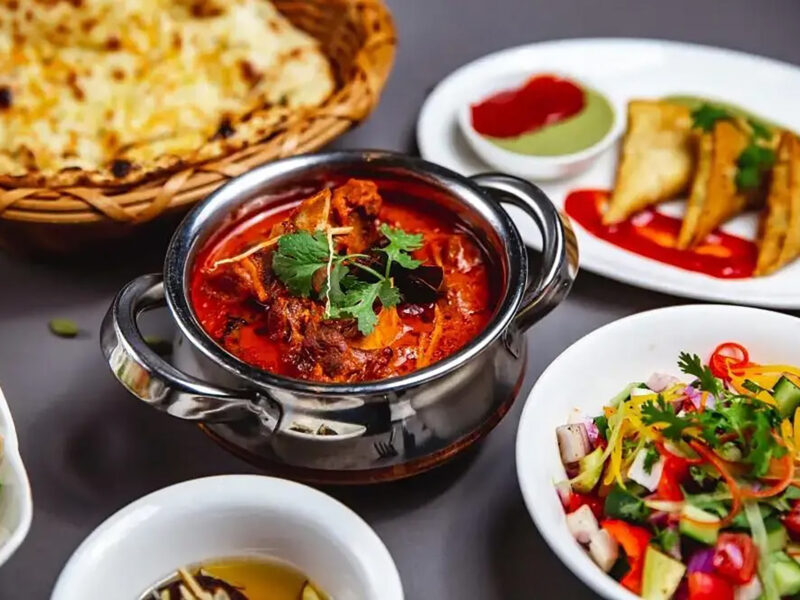 Gourmet Bengali fish curry main course served fresh at Zari Indian restaurant.