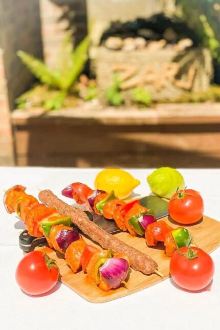 Gourmet skewered chicken tikka fresh off the clay tandoor oven at Zari Crawley.