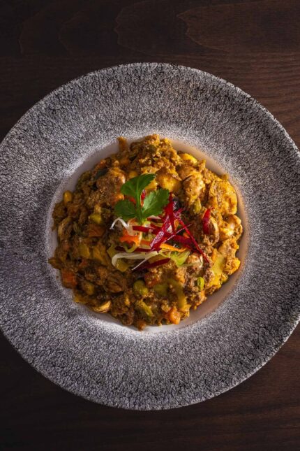 Sharing platters and authentic Indian flavors at Zari Restaurant’s family feast.