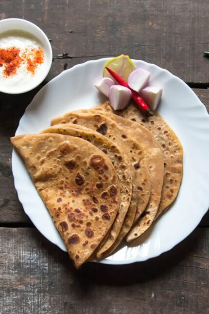 Traditional Punjabi Makke di Roti maize flatbread cooked on a tawa.