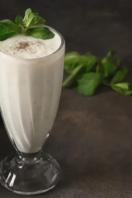 Refreshing sweet mango Lassi yogurt beverage at Zari Indian Restaurant, Crawley.
