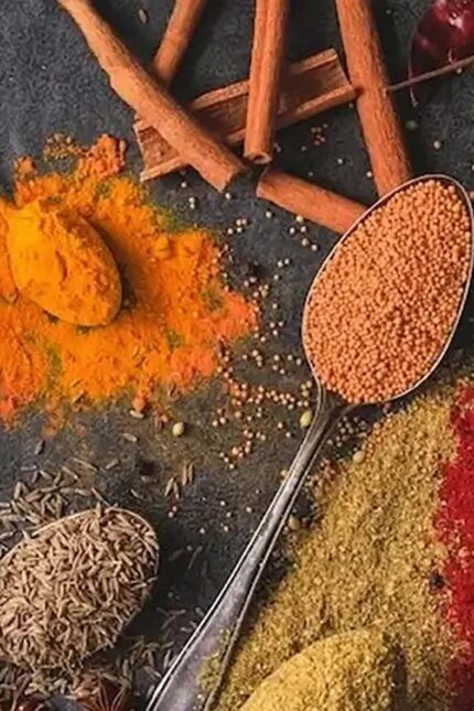 A close-up of vibrant whole Indian spices rich in natural anti-inflammatory properties.