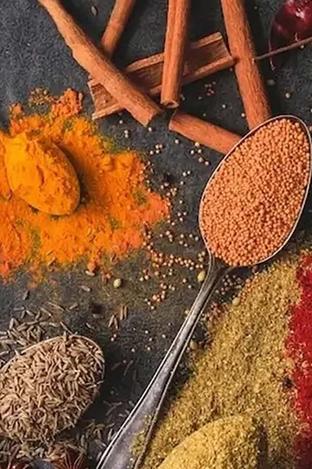 A close-up of vibrant whole Indian spices rich in natural anti-inflammatory properties.
