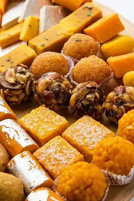 Assorted authentic mithai, burfi, and laddu desserts at Zari Indian Restaurant.