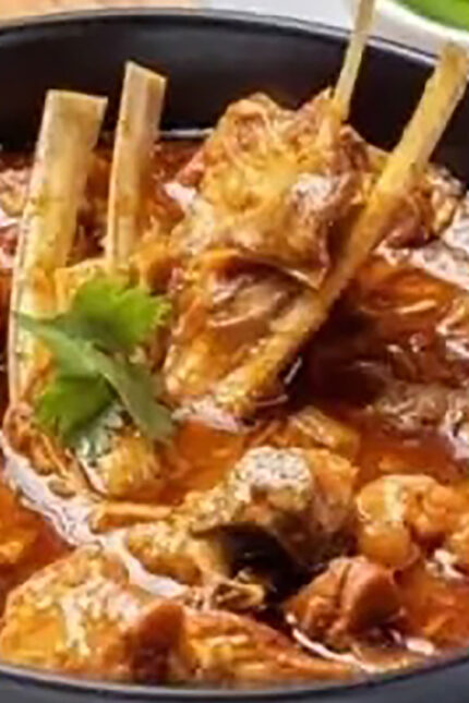 Authentic Rajasthani Ker Sangri wild berries and beans curry cooked in spiced yogurt masala.