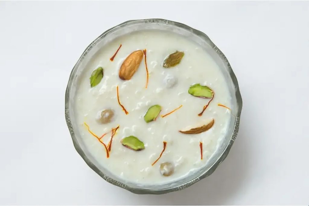 Traditional Rice Kheer pudding topped with nuts and rose petals at Zari Crawley.