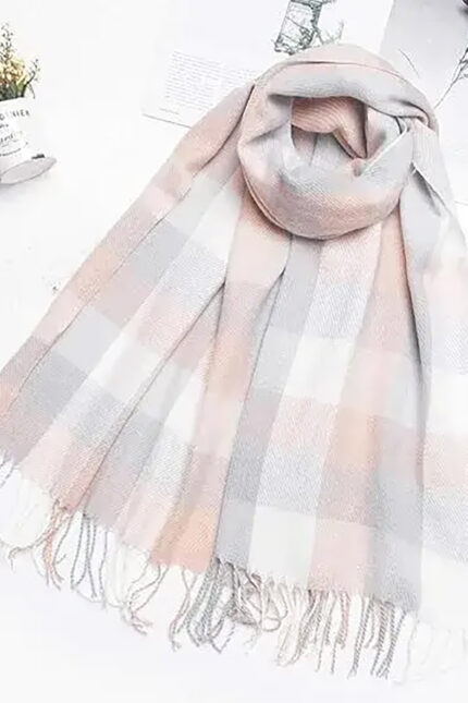 A soft pastel tartan check winter scarf, a popular corporate entertainment gift.