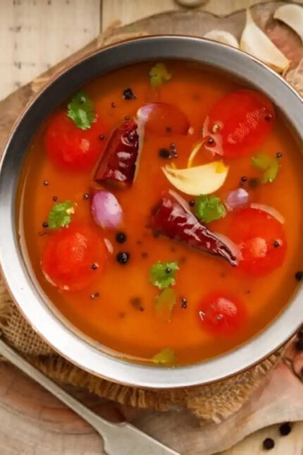 Vibrant lentil-based vegetable sambar curry served hot as an authentic main dish.
