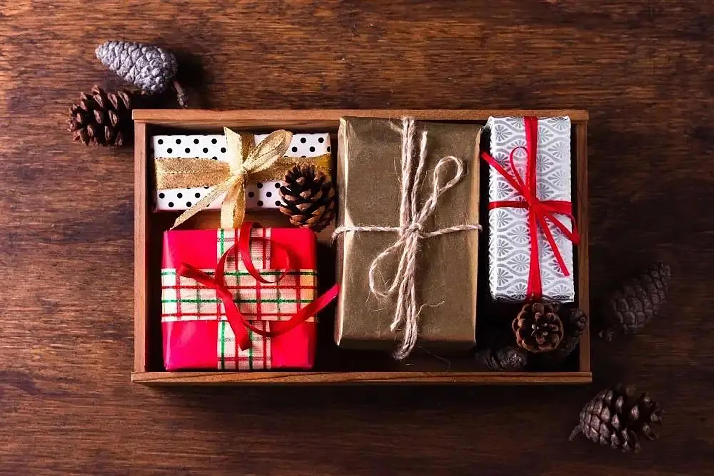 A collection of elegantly wrapped corporate Christmas gifts for work colleagues in Crawley.