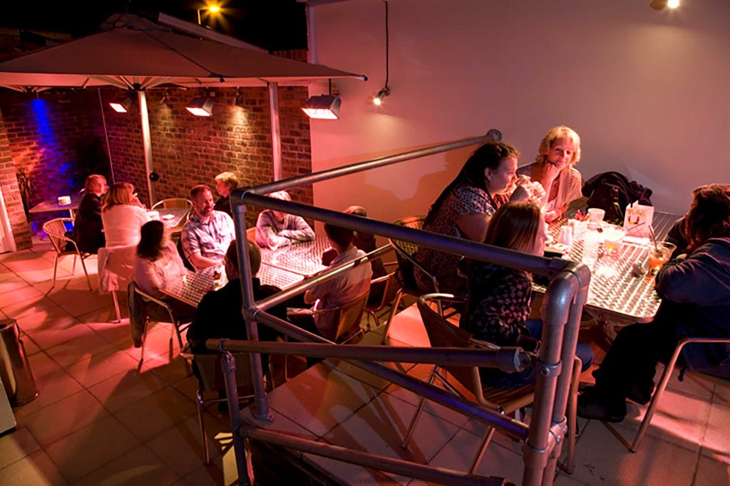 Outdoor dining and party terrace at Zari Restaurant in Crawley