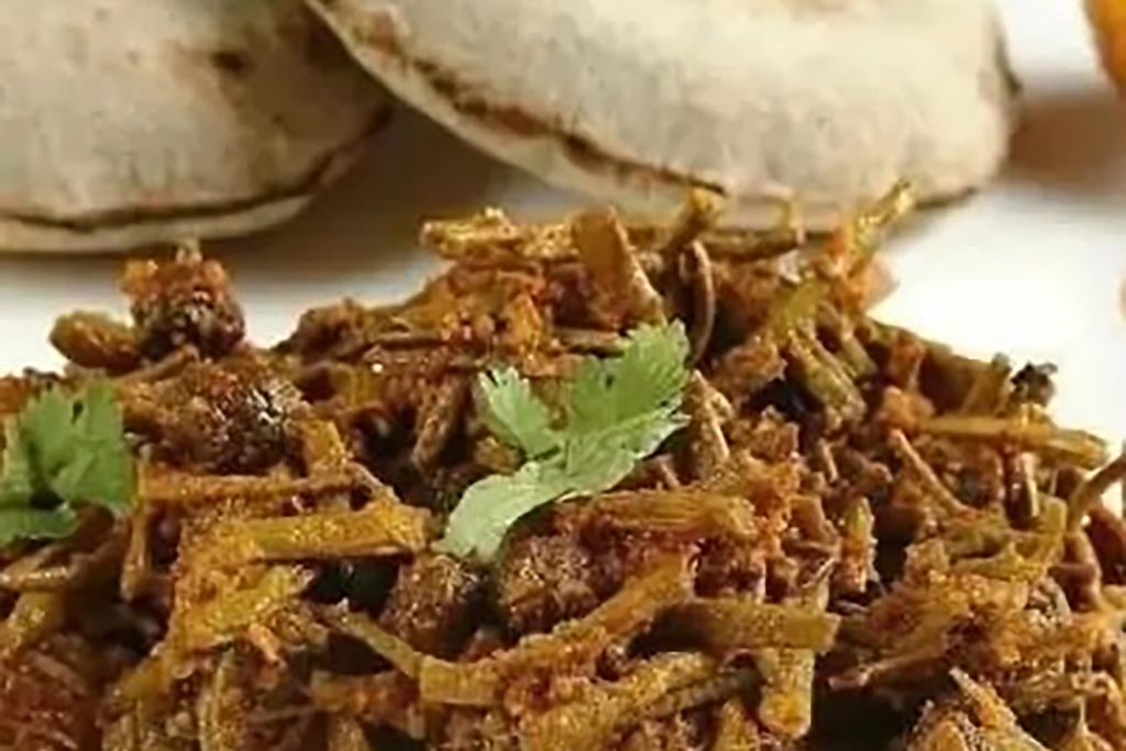 Authentic Rajasthani Ker Sangri dish at Zari Indian Restaurant, Crawley.