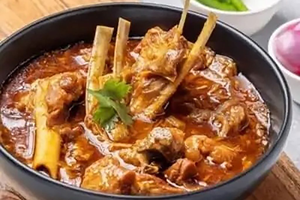 Authentic Rajasthani Ker Sangri wild berries and beans curry cooked in spiced yogurt masala.