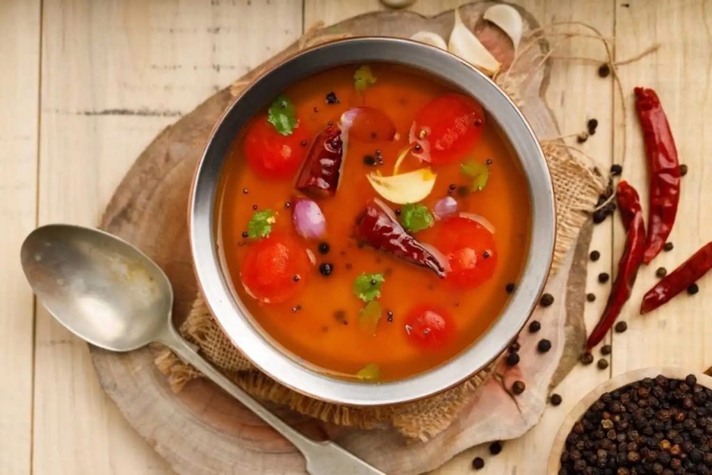 Vibrant lentil-based vegetable sambar curry served hot as an authentic main dish.