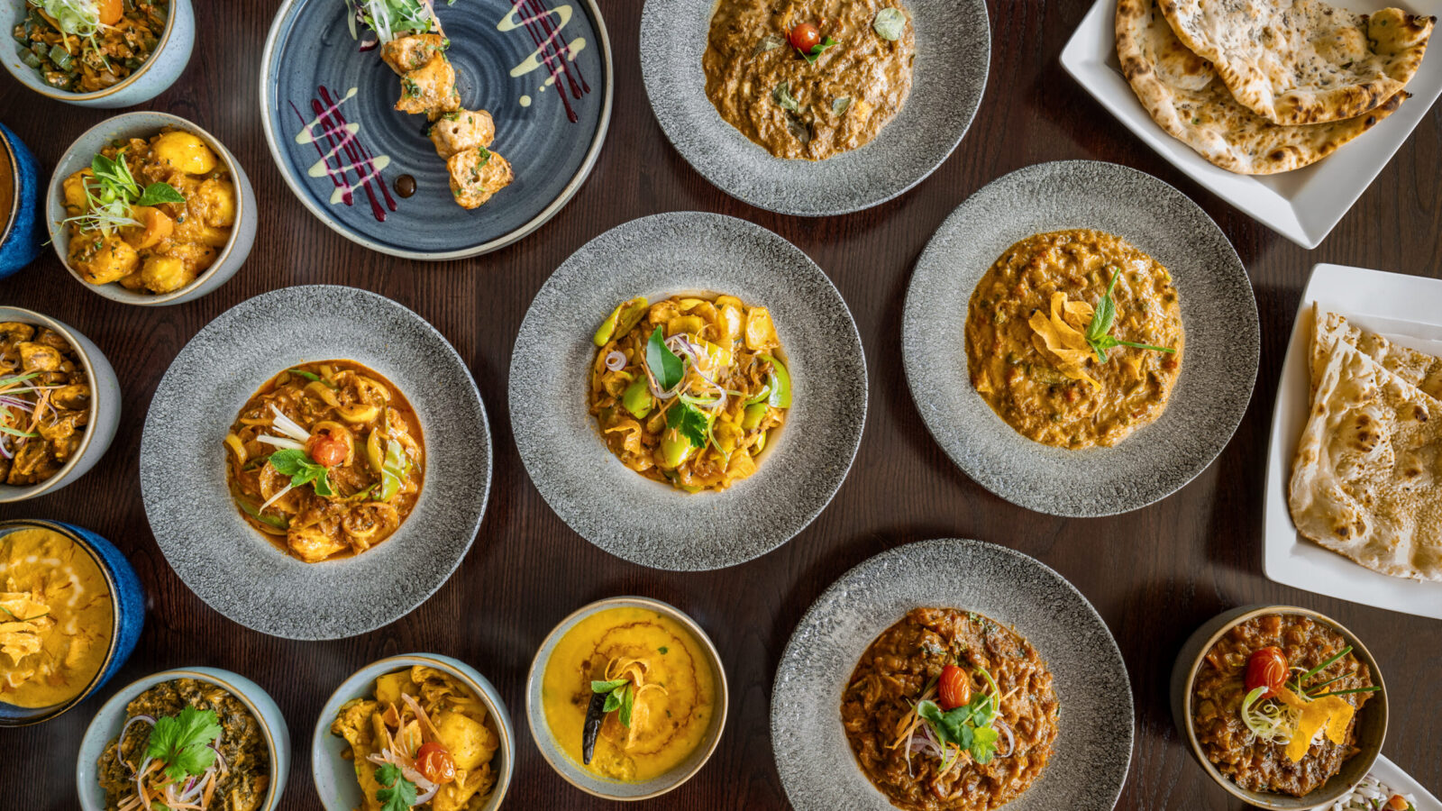 An overhead selection of Indian dishes for Christmas parties at Zari
